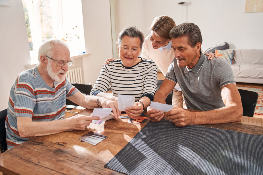 people playing game in memory care center after recognizing signs it's time for memory care