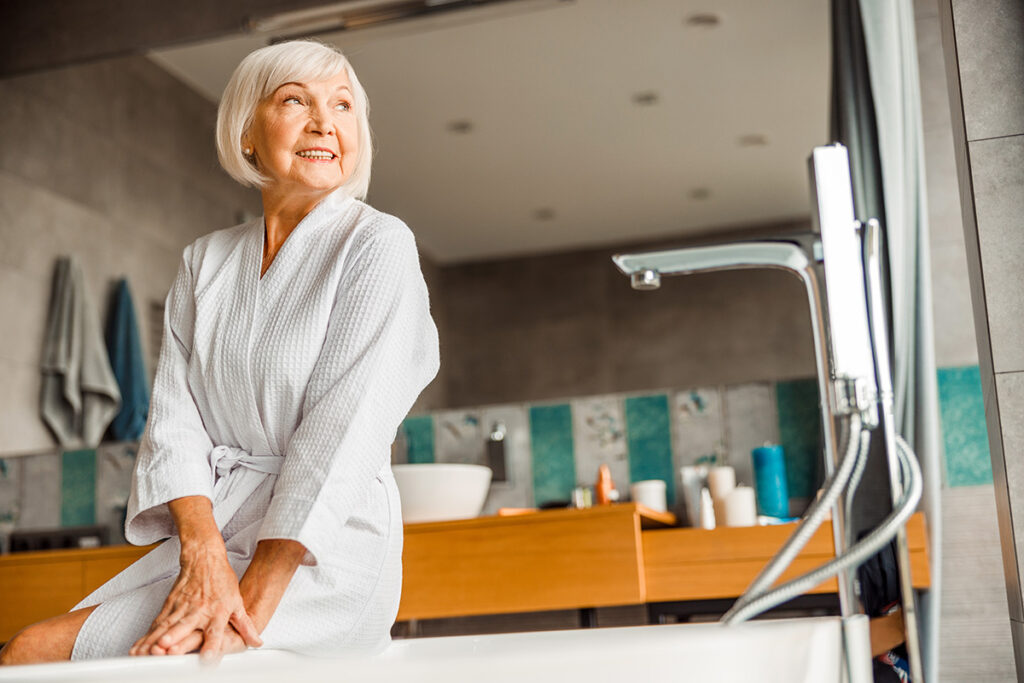 a senior woman prepares for a spa treatment