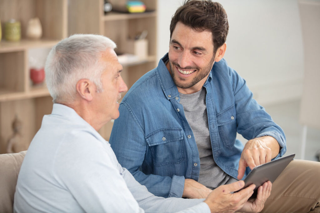 son and father having a conversation about senior living