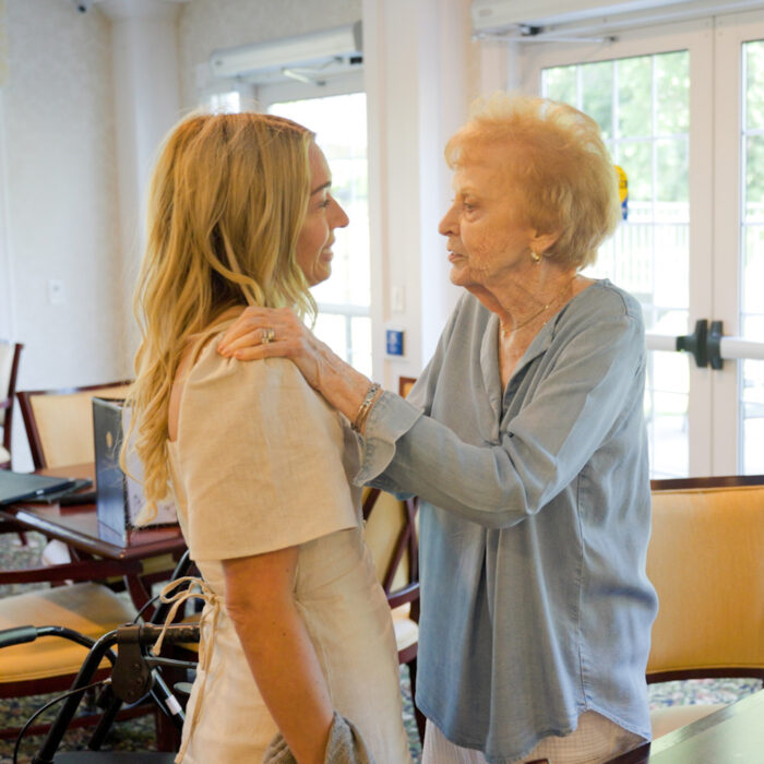 Smiling resident at The Arbors assisted living community