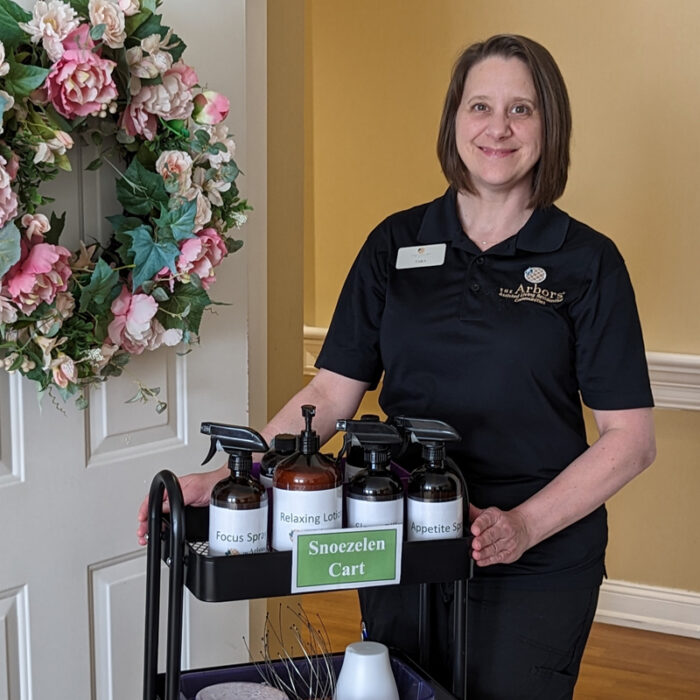 Caregiver offering self-care with a relaxing activity