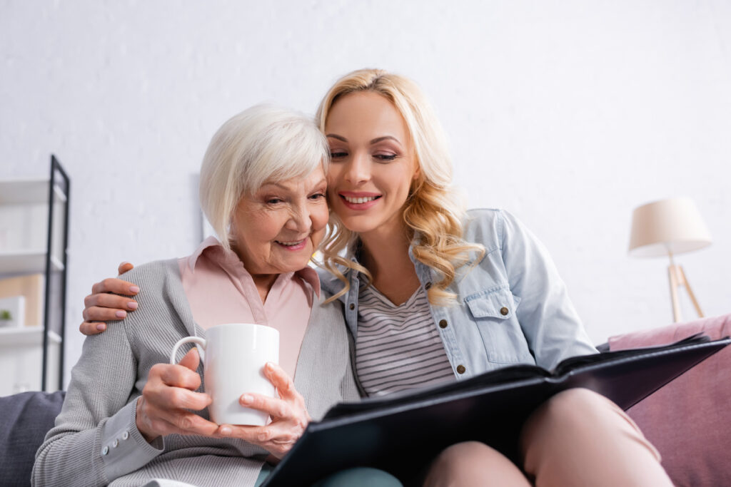 Senior at home care with young adult