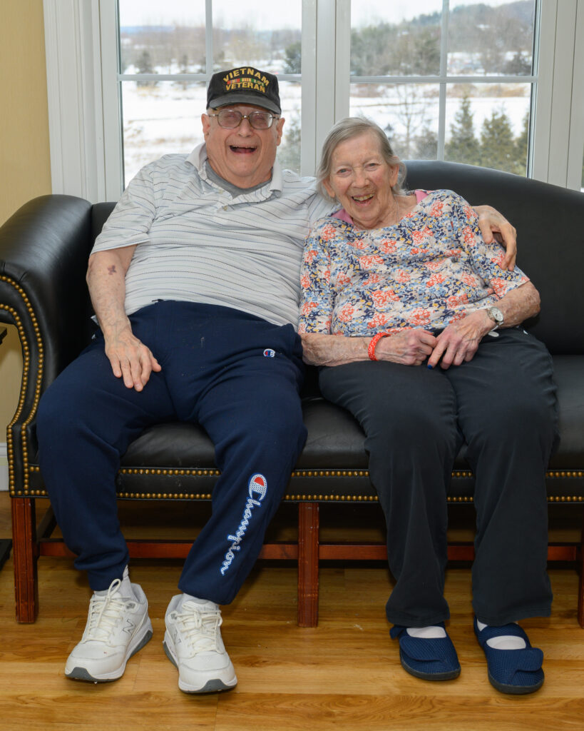 Residents laughing together at The Arbor