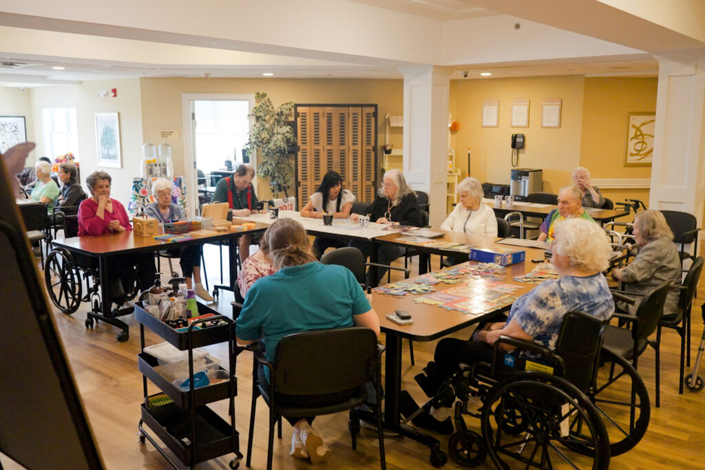 Room of seniors sitting at tables