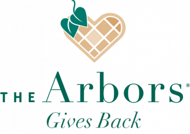 the arbors gives back logo